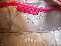Michael Kors Jet Set Item Medium Pocket Crossbody Bag Tech Attached Carmine Pink