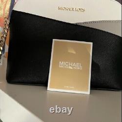 Michael Kors Jet set Travel Medium Dome Metallic Silver Leather Cross Body Bag